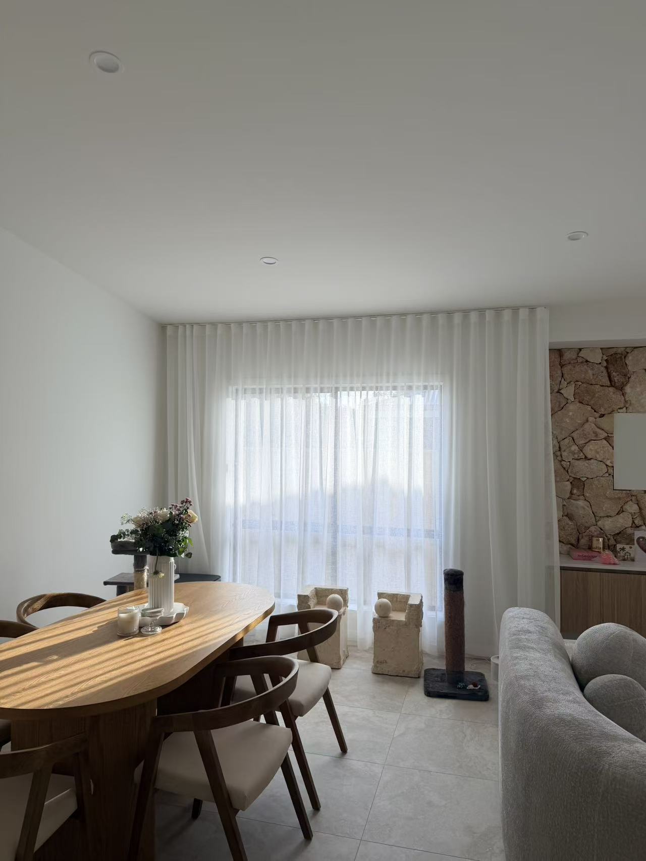 Ceiling-mounted semi-sheer curtains installed in a Bahrs Scrub home